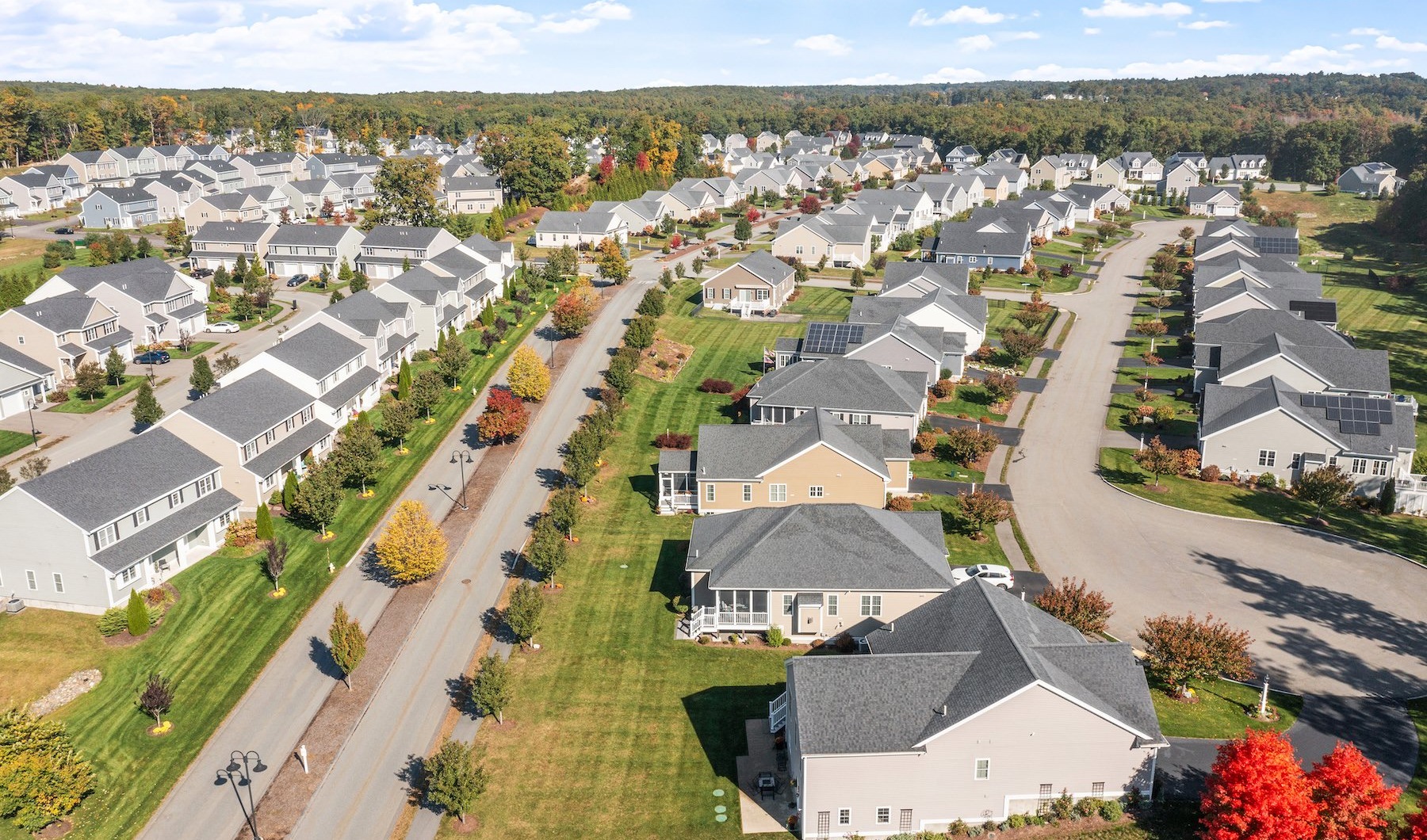 aerial of property showing nearby parking and nearness to a local community