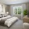 Large well lit bedroom with plush carpets and large windows 